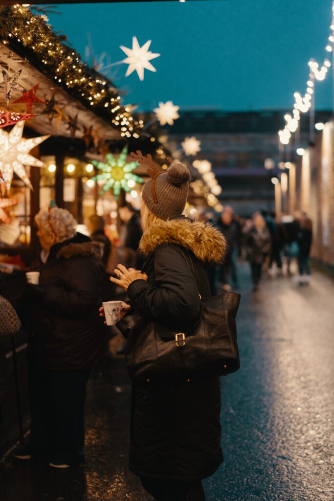 2018 Merry Go Round in Edinburgh Christmas Market Stalls Photo by Ross Sneddon on Unsplash Enjoying the stalls at the 2018 Edinburgh Christmas Market Stalls Photo by Ross Sneddon on Unsplash