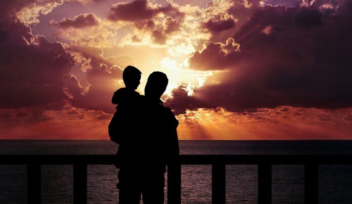 Father and son sunset