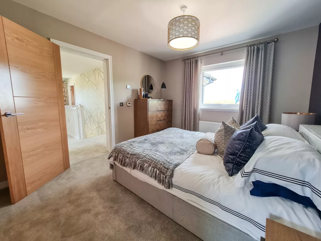 Upstairs in the Kintail, there is a principal bedroom with fitted wardrobes, a second double bedroom, and a single bedroom. The family bathroom, fitted with Twyford sanitaryware, makes up the overall accommodation.